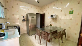 Casa uma Quadra da Praia das Asturias com área gourmet